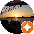 Sonnenuntergang über dem Meer vom Boot aus